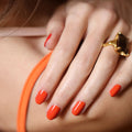 An arm swatch of Manucurist Coral Reef variant: Coral Reef