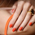 An arm swatch of Manucurist Coral Reef variant: Coral Reef