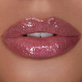 Model image of Hourglass Unreal High Shine Volumizing Lip Gloss variant: Cosmic