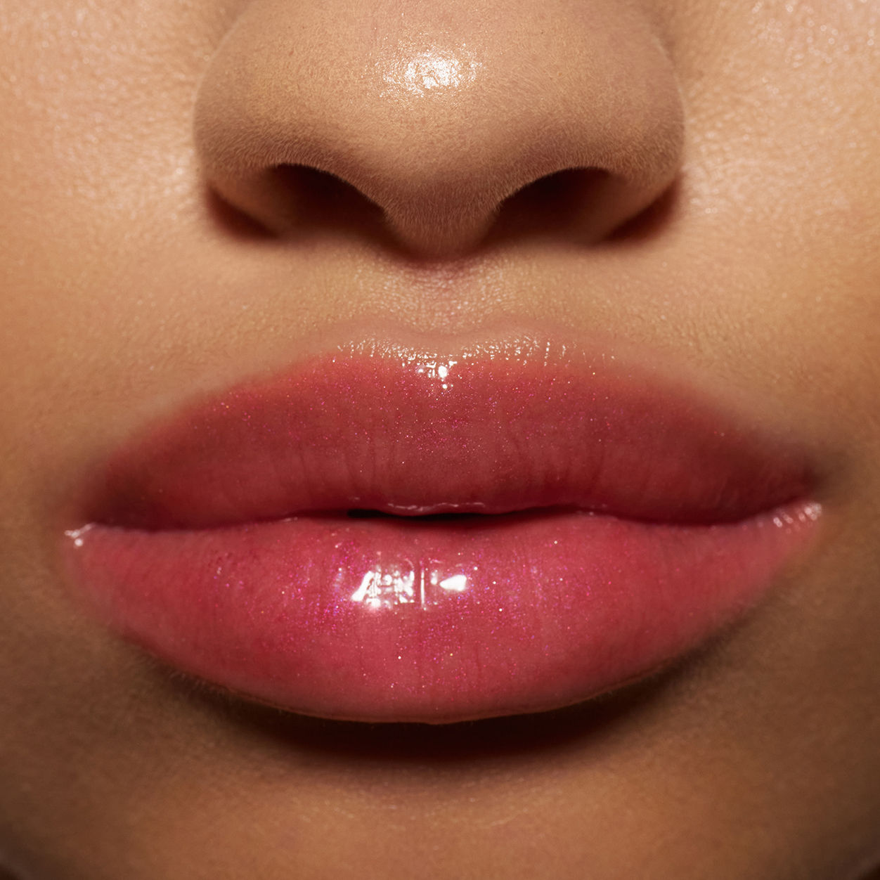 Model image of Neen Glisten Up Lip Gloss variant: Crush