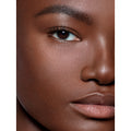 Model image of Pat McGrath Labs Sublime Perfection Full Coverage Concealer variant: D33