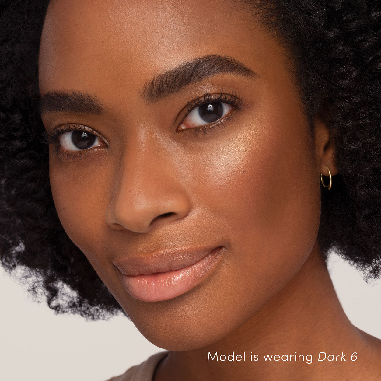 Model image of Jane Iredale HydroPure Tinted Serum variant: Dark 6