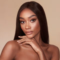 Model image of Charlotte Tilbury Airbrush Bronzer variant: Deep