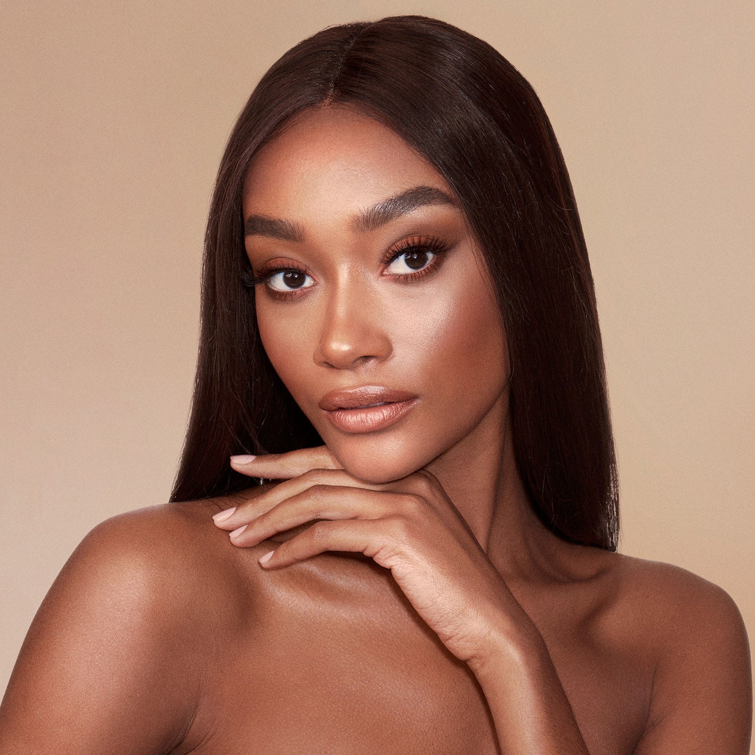 Model image of Charlotte Tilbury Airbrush Bronzer variant: Deep