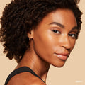 Model image of Bobbi Brown Vitamin Enriched Hydrating Skin Tint SPF 15 with Hyaluronic Acid variant: Deep 2