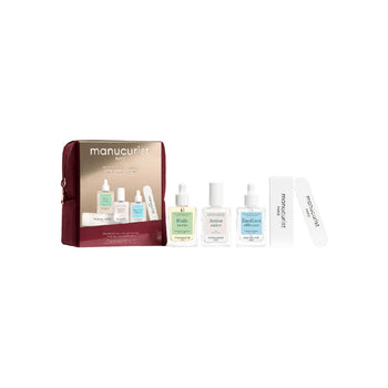 A Manucurist Active Shine Manicure Nail Care Set featuring a maroon zippered pouch, three glass dropper bottles labeled Huile verte, Active shine, and Emollient efface, and two nail files.