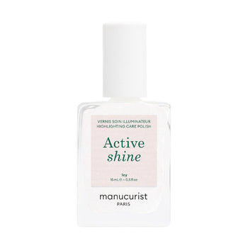 A glass bottle of Manucurist Active Shine Icy (Limited Edition) nail polish, featuring a glittery finish and a white cap.