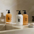 Lifestyle image of Diptyque Velvet Lotion  For The Hands variant: 11.8 oz