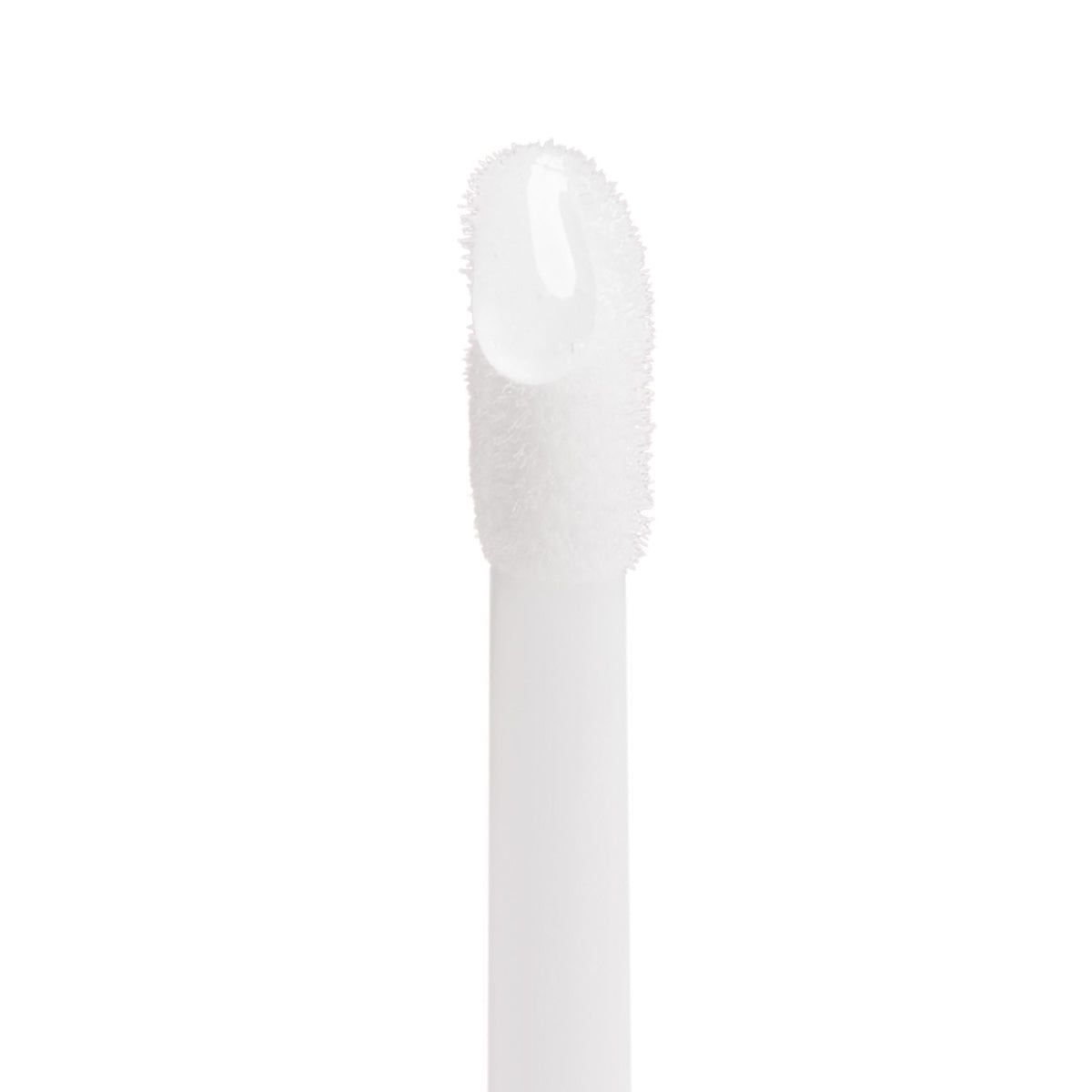 Close-up of a Trish McEvoy The Bluemercury Exclusive Plump, Protect & Perfect Nude Lip Wardrobe (Limited Edition) lip gloss applicator wand tipped with a clear, viscous product for lip perfection.
