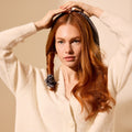 Model image of Oribe Hair Alchemy Heatless Styling Balm variant: Default Title