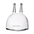 White dome-shaped NuFace Trinity+ Lifting & Smoothing Lip & Eye Microcurrent Attachment with two slender metal prongs extending from the top to help lift brows.