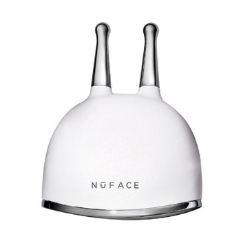 White dome-shaped NuFace Trinity+ Lifting & Smoothing Lip & Eye Microcurrent Attachment with two slender metal prongs extending from the top to help lift brows.
