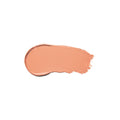 A single swatch of RMS Beauty Cashmere Matte Eyelights nourishing, matte cream eyeshadow in a peachy-nude shade.