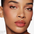 Model image of Nars Afterglow Lip Shine variant: Dolce Vita