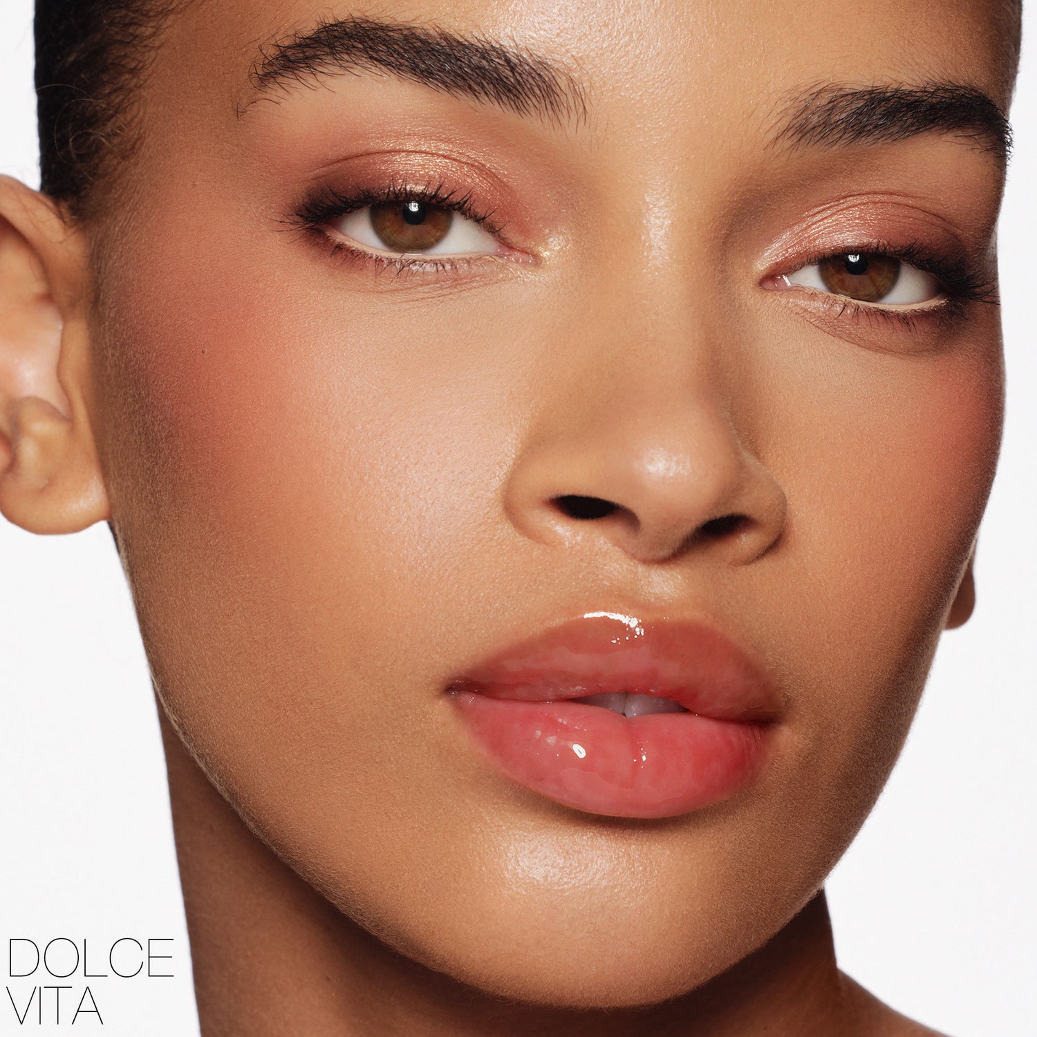 Model image of Nars Afterglow Lip Shine variant: Dolce Vita