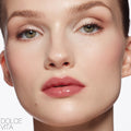 Model image of Nars Afterglow Lip Shine variant: Dolce Vita