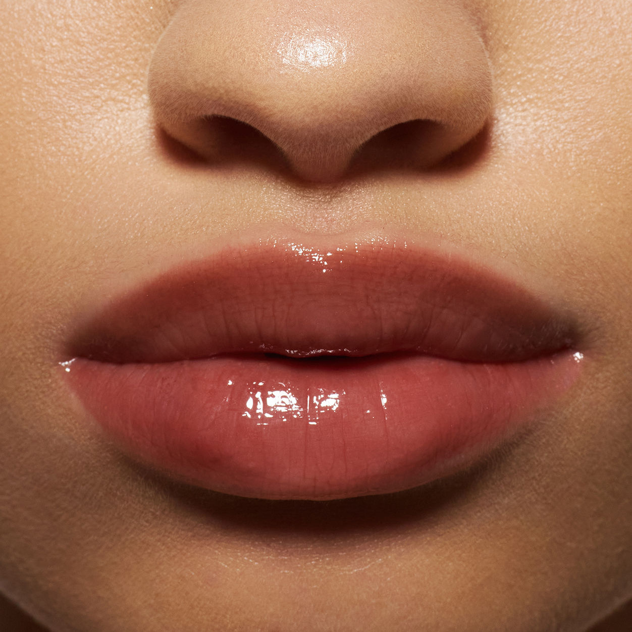 Model image of Neen Glisten Up Lip Gloss variant: Flame