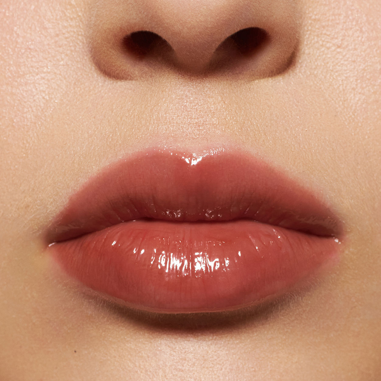 Model image of Neen Glisten Up Lip Gloss variant: Flame