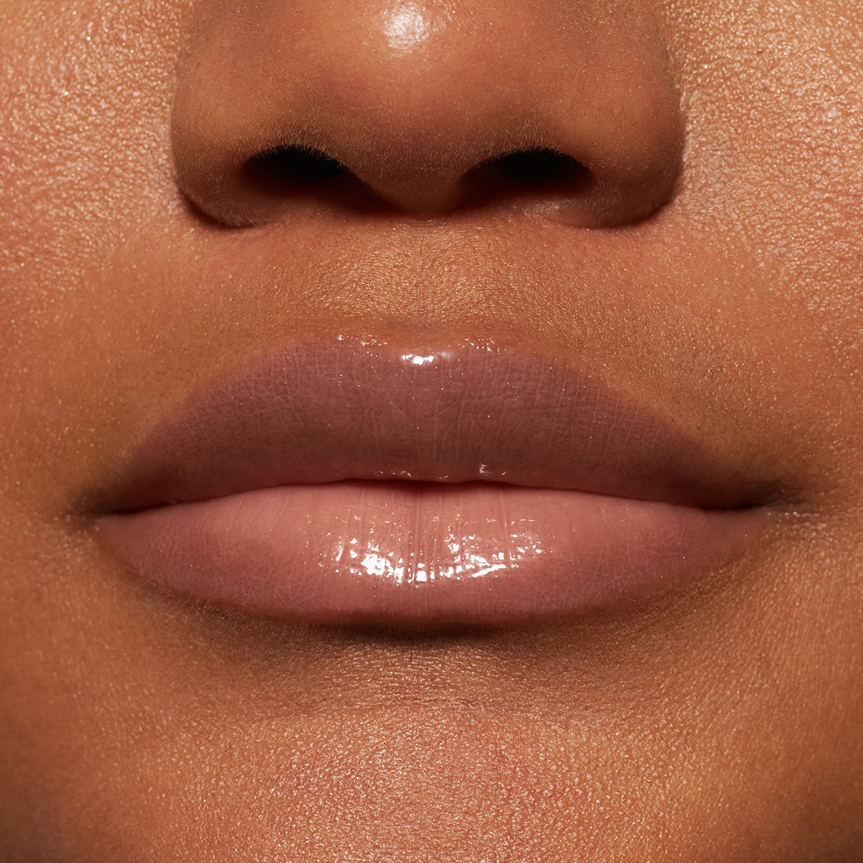 Model image of Neen Glisten Up Lip Gloss variant: Flirt