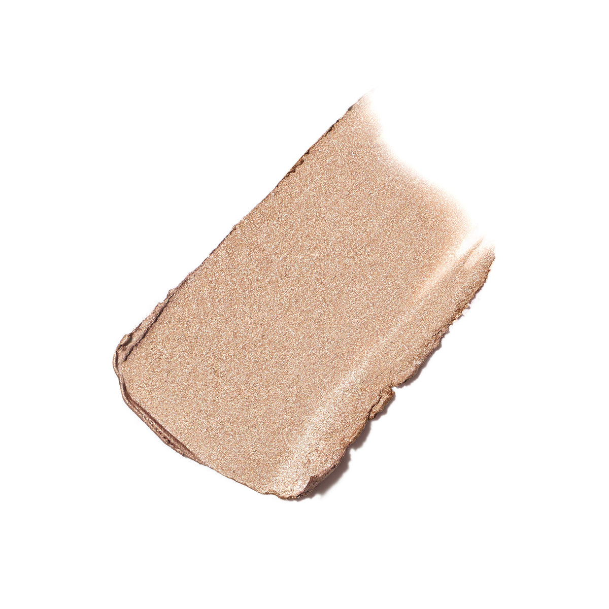 A diagonal swatch of shimmering champagne-colored ColorLuxe Eye Shadow Stick cream-to-powder eye shadow.