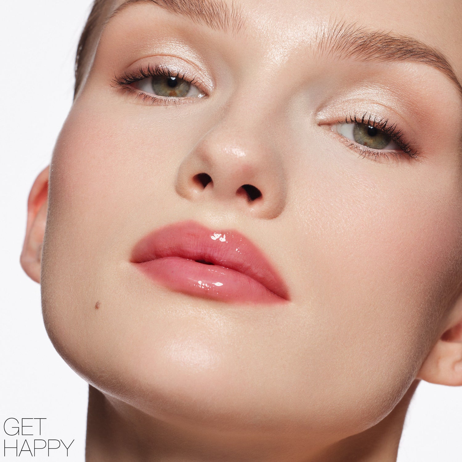 Model image of Nars Afterglow Lip Shine variant: Get Happy