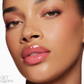 Model image of Nars Afterglow Lip Shine variant: Get Happy