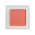 Square Neen Going Rouge Cream Cheek and Lip compact containing a pan of coral cream, with the phrases may you feel beautiful, may you be happy, and may you be free embossed on the frame.