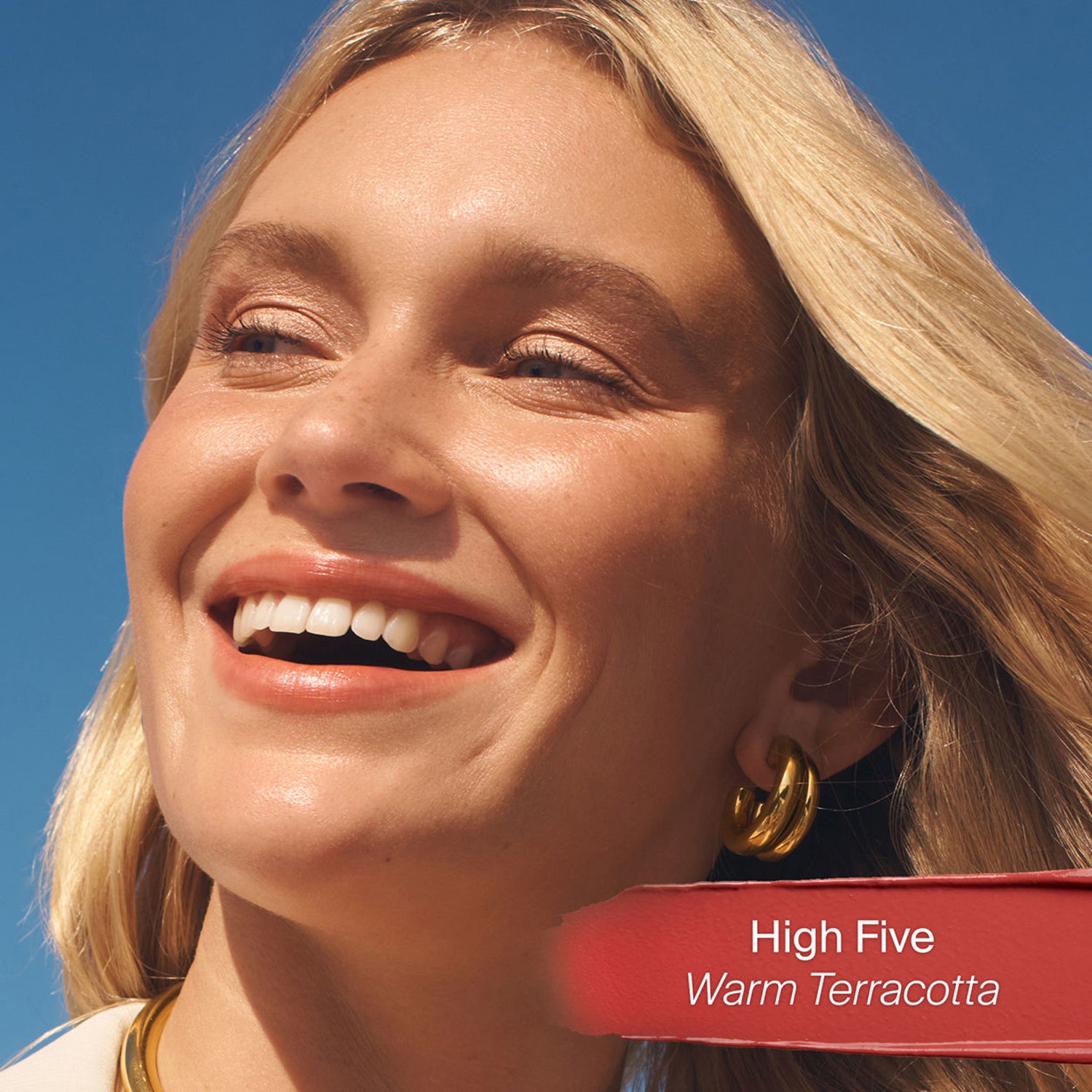 Model image of Supergoop! Lipshade 100% Mineral Lip Color SPF 30 variant: High Five (Warm Terracotta)