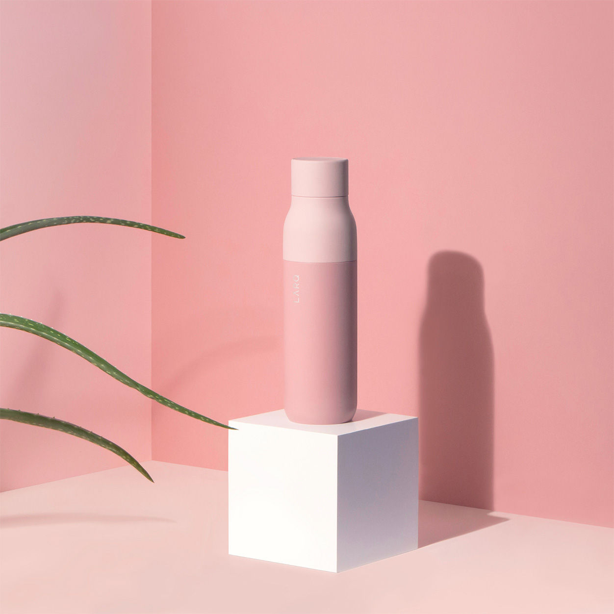 Lifestyle image of Larq Bottle PureVis variant: Himalayan Pink