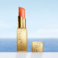 Lifestyle image of Tom Ford Soleil Lip Balm variant: Jetset