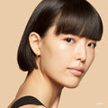 Model image of Bobbi Brown Vitamin Enriched Hydrating Skin Tint SPF 15 with Hyaluronic Acid variant: Light 1