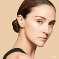 Model image of Bobbi Brown Vitamin Enriched Hydrating Skin Tint SPF 15 with Hyaluronic Acid variant: Light 2