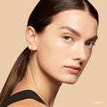 Model image of Bobbi Brown Vitamin Enriched Hydrating Skin Tint SPF 15 with Hyaluronic Acid variant: Light 3