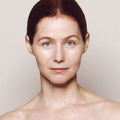 Model image of Kjaer Weis Invisible Touch Liquid Foundation variant: Like Porcelain F118