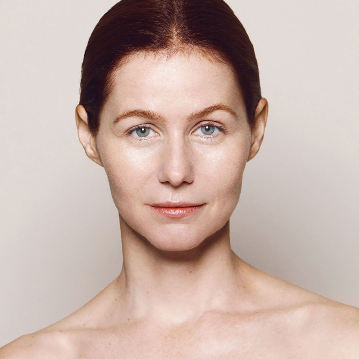 Model image of Kjaer Weis Invisible Touch Liquid Foundation variant: Like Porcelain F118