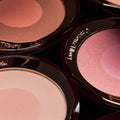 Lifestyle image of Charlotte Tilbury Love Glow variant: Love Glow