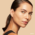 Model image of Bobbi Brown Vitamin Enriched Hydrating Skin Tint SPF 15 with Hyaluronic Acid variant: Medium 2