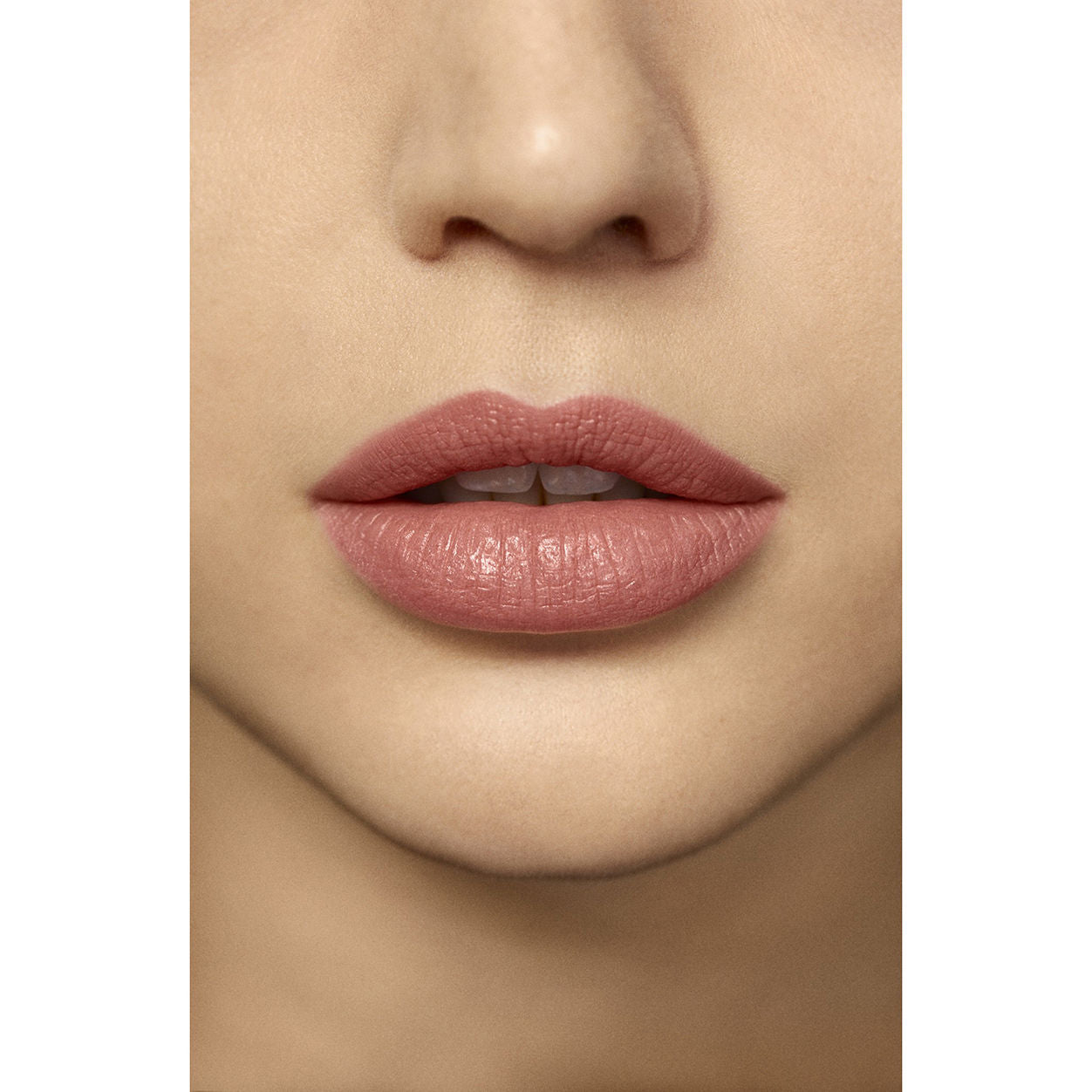 Model image of Laura Mercier Rouge Essentiel Silky Crème Lipstick variant: Nu Préféré