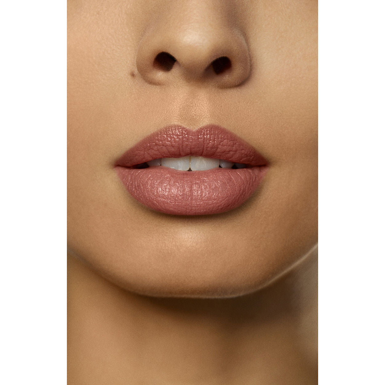 Model image of Laura Mercier Rouge Essentiel Silky Crème Lipstick variant: Nu Préféré