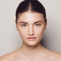 Model image of Kjaer Weis Invisible Touch Liquid Foundation variant: Paper Thin F140
