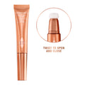 Model image of Charlotte Tilbury Beauty Light Wand variant: Peachgasm