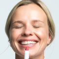 Model image of Ogee Tinted Sculpted Lip Oil variant: Petunia