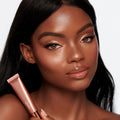 Model image of Charlotte Tilbury Beauty Light Wand variant: Pinkgasm