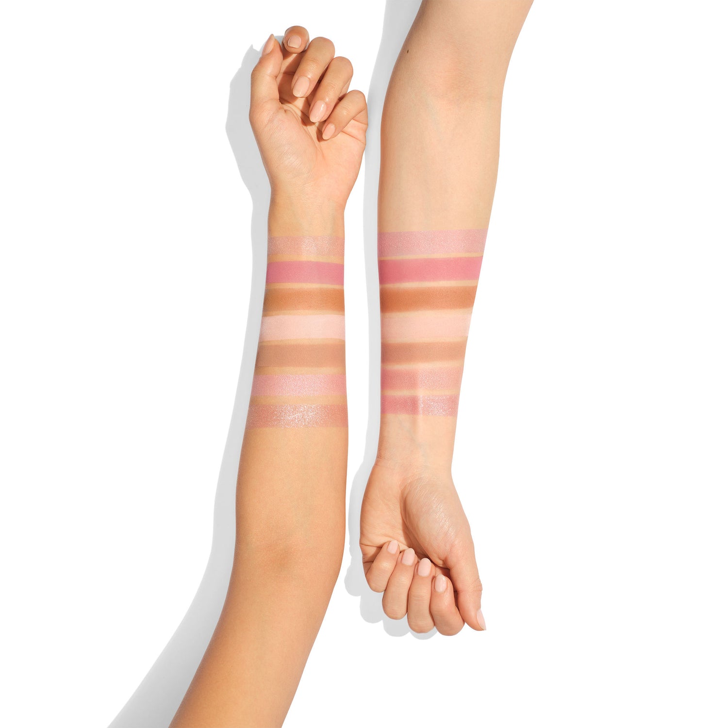 An arm swatch of Charlotte Tilbury  Instant Look In A Palette (Limited Edition) variant: Pretty, Glowing Beauty