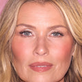 Model image of Charlotte Tilbury Unreal Lip + Cheek Glow Blush Stick with Hyaluronic Acid variant: Rosy Glow