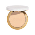 Ogee Sculpted Skin-Perfecting Powder in a round compact with a gold base and white lid, featuring the brand name embossed in the center to provide a blurring finish.