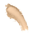 A swatch of beige Ogee Sculpted Skin-Perfecting Powder showing both loose, textured grains and a smooth, buildable powder application with a blurring finish.