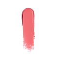A thick, vertical swipe of buildable, coral pink Trish McEvoy Fast-Track Lip & Cheek cream makeup.