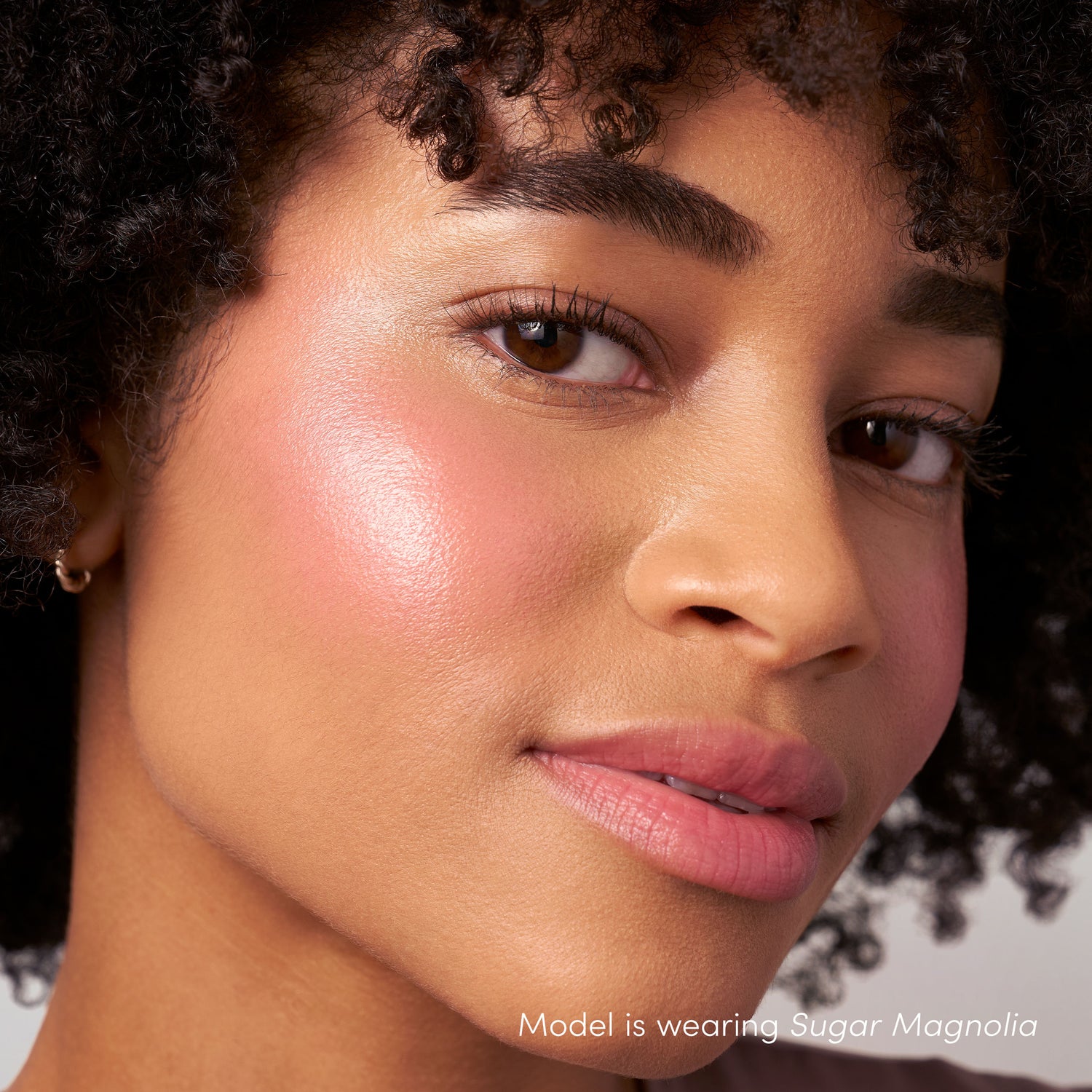 Model image of Jane Iredale ColorLuxe Liquid Blush variant: Sugar Magnolia