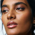 Model image of U Beauty The Plasma Lip Compound Tinted variant: Sunset